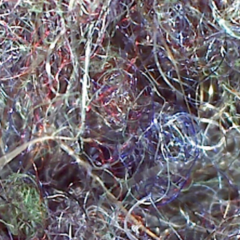 A bundle of microfiber filtered from a load of winter laundry done in a top-loading washing machine.